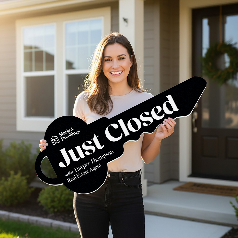 Woman holding a 'Just Closed' sign in front of a house, with Real Estate Agent branding.